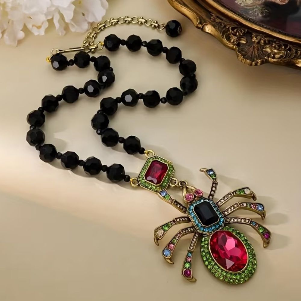 Vintage Black and Gold Spider Necklace with Red and Green Accents